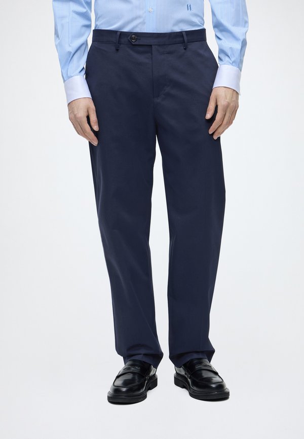 Tommy Hilfiger DC TECH  - Trousers - carbon navy