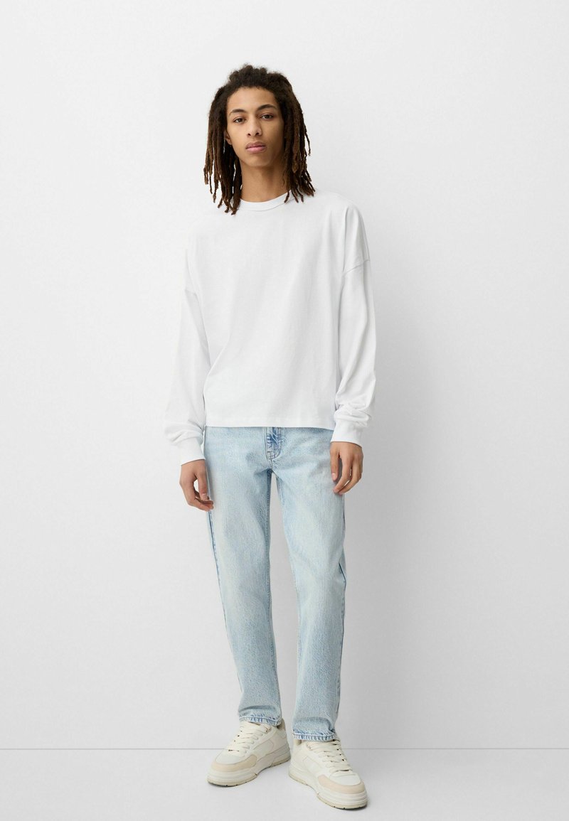 Bershka Jeans Tapered Fit Media 1