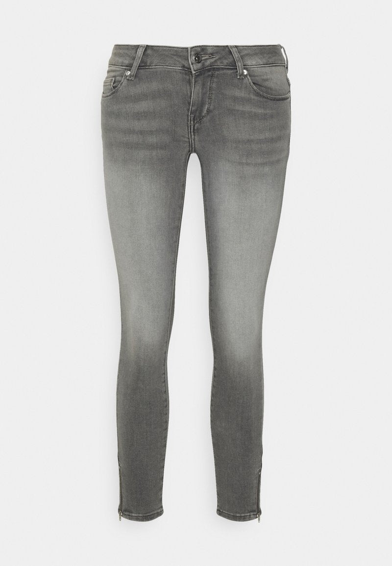 Schlanke Jeans aus grau verblassten Denim. Mit einem Reißverschlussdetails am Knöchel, fünf Taschen und klassischen Gürtelschlaufen. Weiche Textur mit leichtem Stretch.