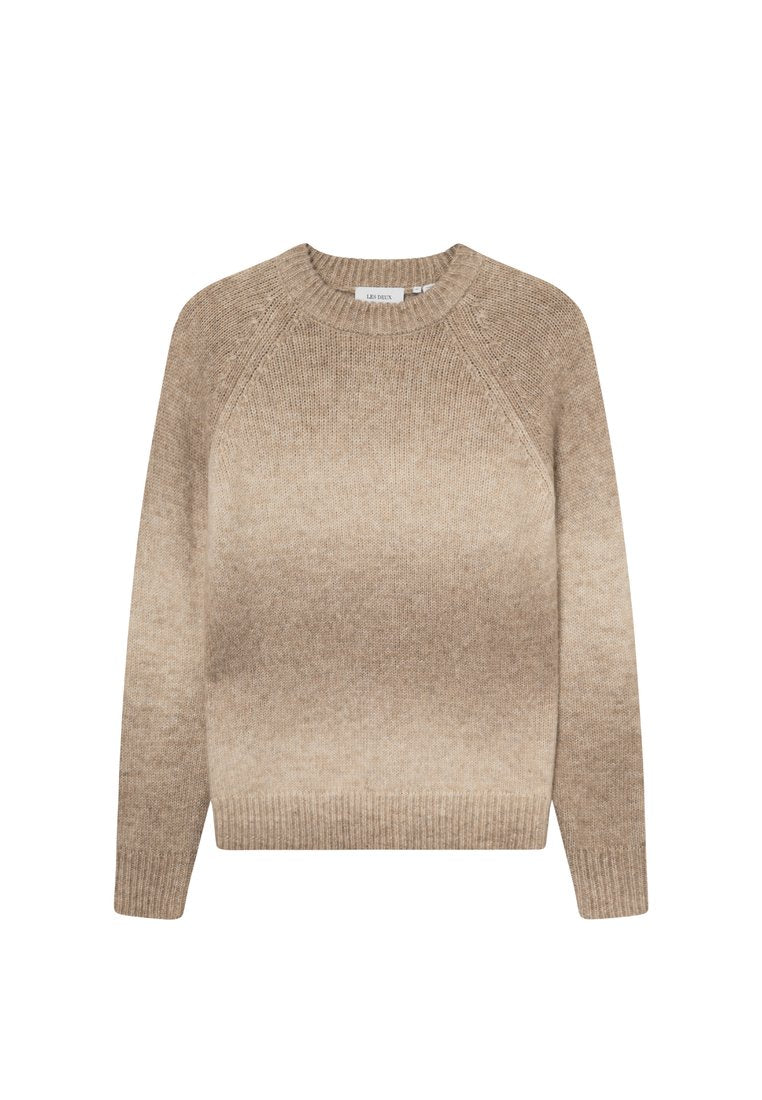 Beiger Gradient-Pullover mit Rundhalsauschnitt, Raglanärmeln und gerippten Bündchen und Saum, aus einem weichen, strukturierten Strickstoff gefertigt.