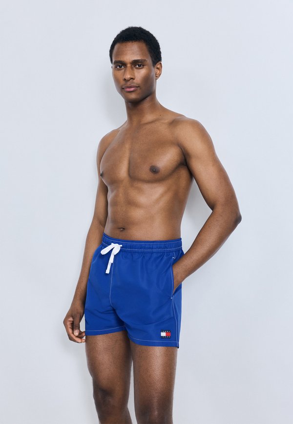Tommy Hilfiger HERITAGE LOGO MID LENGTH  - Swimming shorts - fizzy blue
