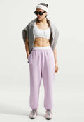 Nike Sportswear W NK STDO FLC MW HR OS CFF PNT - Tracksuit bottoms - bleached lilac/sail