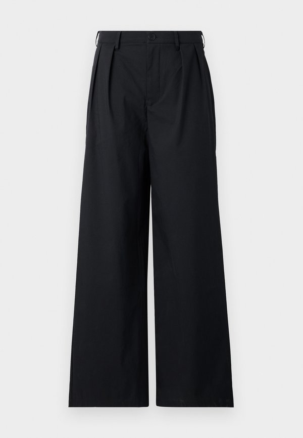 New Balance BOYLSTON - Trousers - black