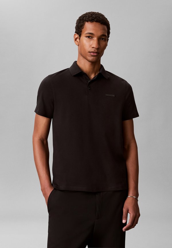 Calvin Klein SLIM SUPIMA LOGO PATCH  - Polo shirt - black