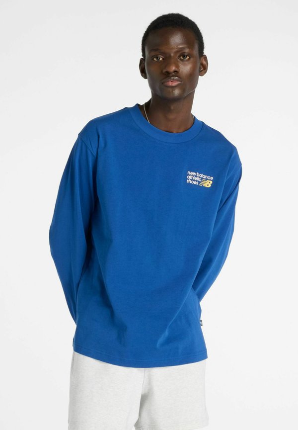 New Balance ATHLETICS PREMIUM BACK LOGO - Long sleeved top - galaxy blue