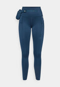 Navy-Leggings aus dehnbarem Material, mit einem Bund, der einen Gürtel enthält, seitlichen Taschen und einem kleinen angebundenen Beutel zur Aufbewahrung.