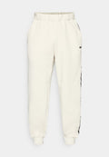 Under Armour ICON HEAVY JOGGER - Tracksuit bottoms - summit white/white