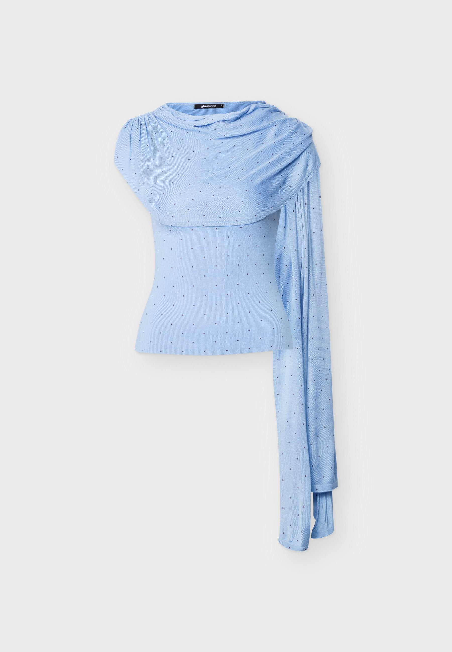 Hellblaues Ein-Schulter-Oberteil mit kleinen schwarzen Punkten und gerafftem, drapiertem Stoff, der sich von der Schulter bis zum Handgelenk erstreckt.