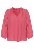 Rosa Leinenbluse mit V-Ausschnitt und rüschigem Halsausschnitt. Verfügt über lange Puffärmel mit elastischen Bündchen und einem lässigen Schnitt. Weicher Stoff.