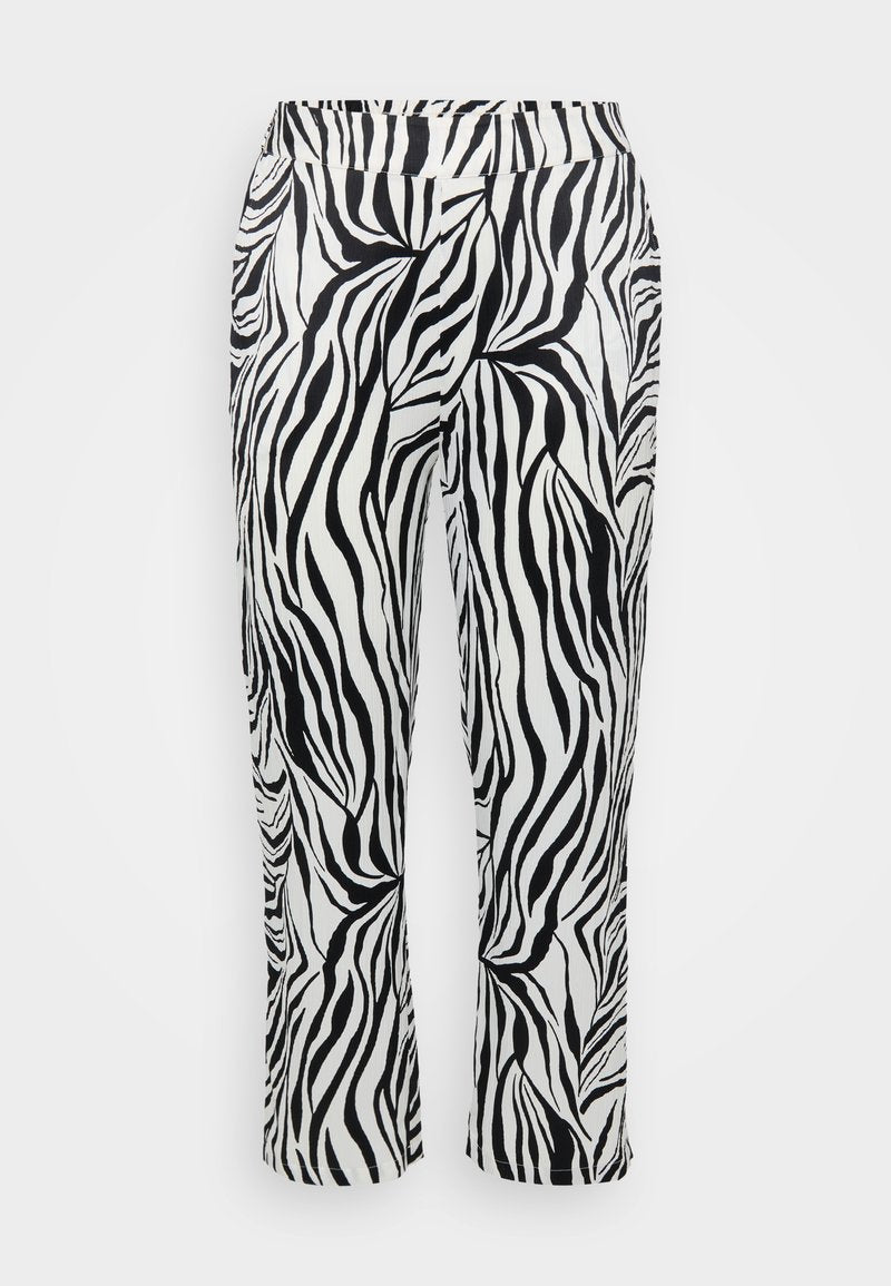 Schwarz-weiß gestreifte Hose mit fließendem Design, elastischem Bund und leicht ausgestellt geschnittenen Beinen mit strukturiertem Finish.