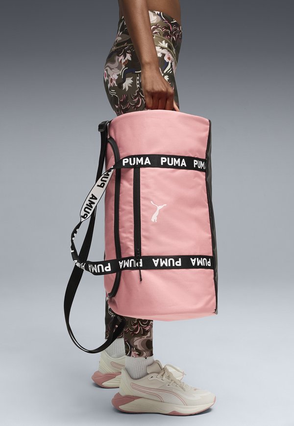 Puma AT ESS BARREL BAG UNISEX - Sports bag - wild pink