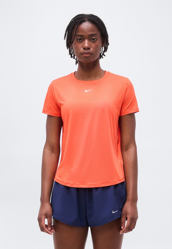 Nike Performance ONE CLASSIC - Sports T-shirt - light crimson/white