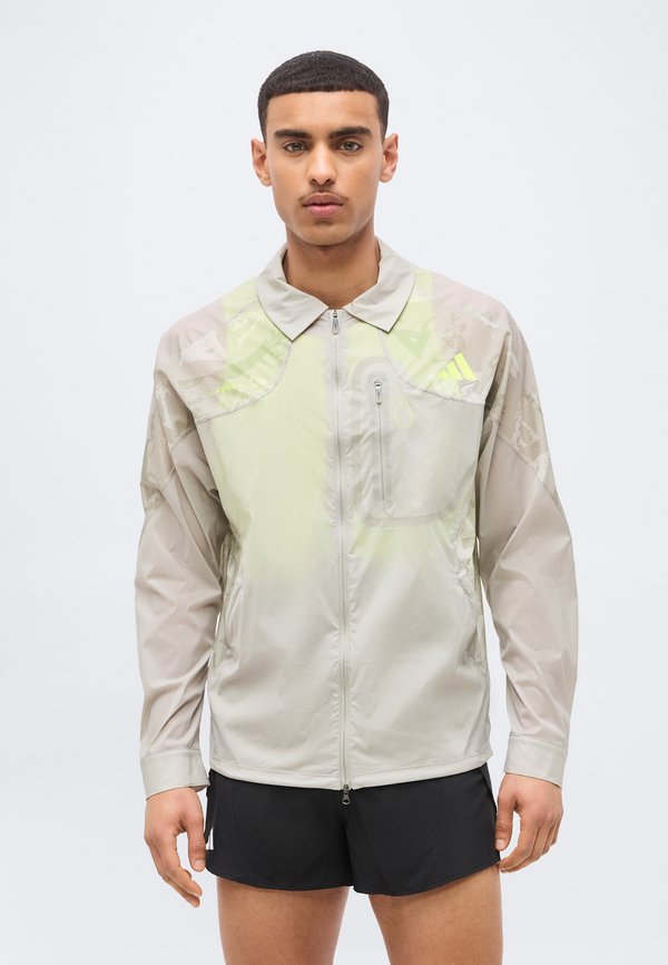 adidas Performance LABRUM - Windbreaker - sesame/solar yellow