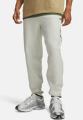 Under Armour UNSTOPPABLE FLEECE - Tracksuit bottoms - summit white