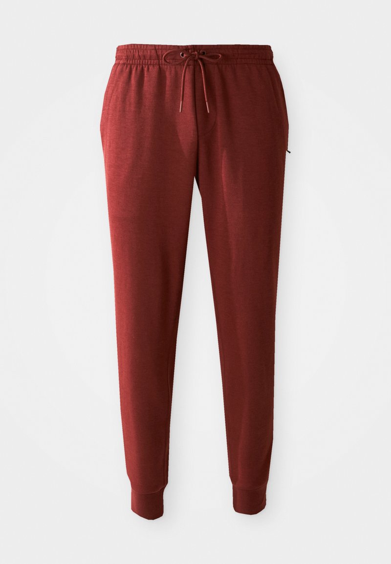 Burgunderfarbene Jogginghosen aus weichem Material, mit einem elastischen Bund und Kordelzug sowie engen Bündchen an den Knöcheln.