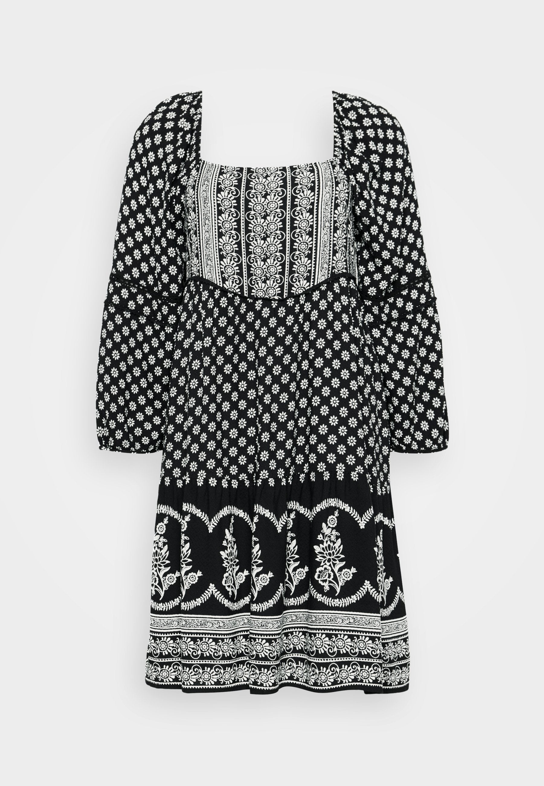 Schwarzes Kleid mit weißen Blumenmustern, weitem Ausschnitt, Puffärmeln und einem ausgestellten Rock mit dekorativen Akzenten.