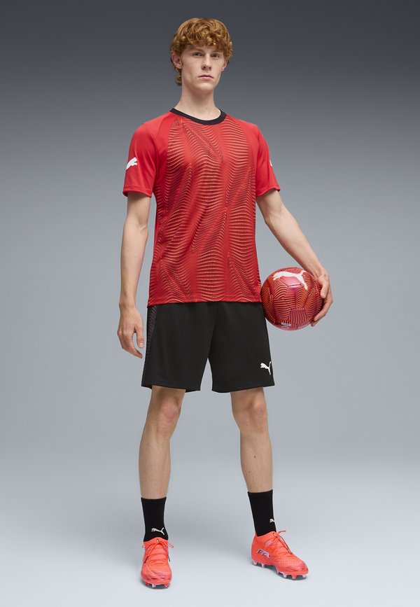 Puma INDIVIDUALFINAL  - Football jersey - glowing red-mint jelly- black- black