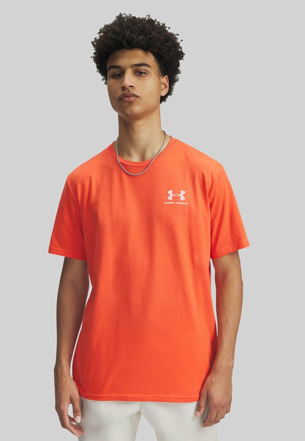 Under Armour LEFT CHEST LOGO - Sports T-shirt - orange