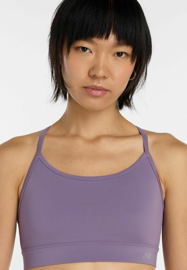 New Balance NB ESSENTIAL YOGA BRA - Light support sports bra - candied violet