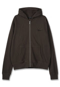 Braune gerippte Kapuzenjacke mit Reißverschluss, zwei vorderen Taschen und einem kleinen Logo, das auf der linken Seite gestickt ist. Weiche Textur und lockere Passform.