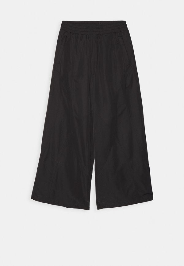 Han Kjøbenhavn OVERSIZED TRACK TROUSERS UNISEX