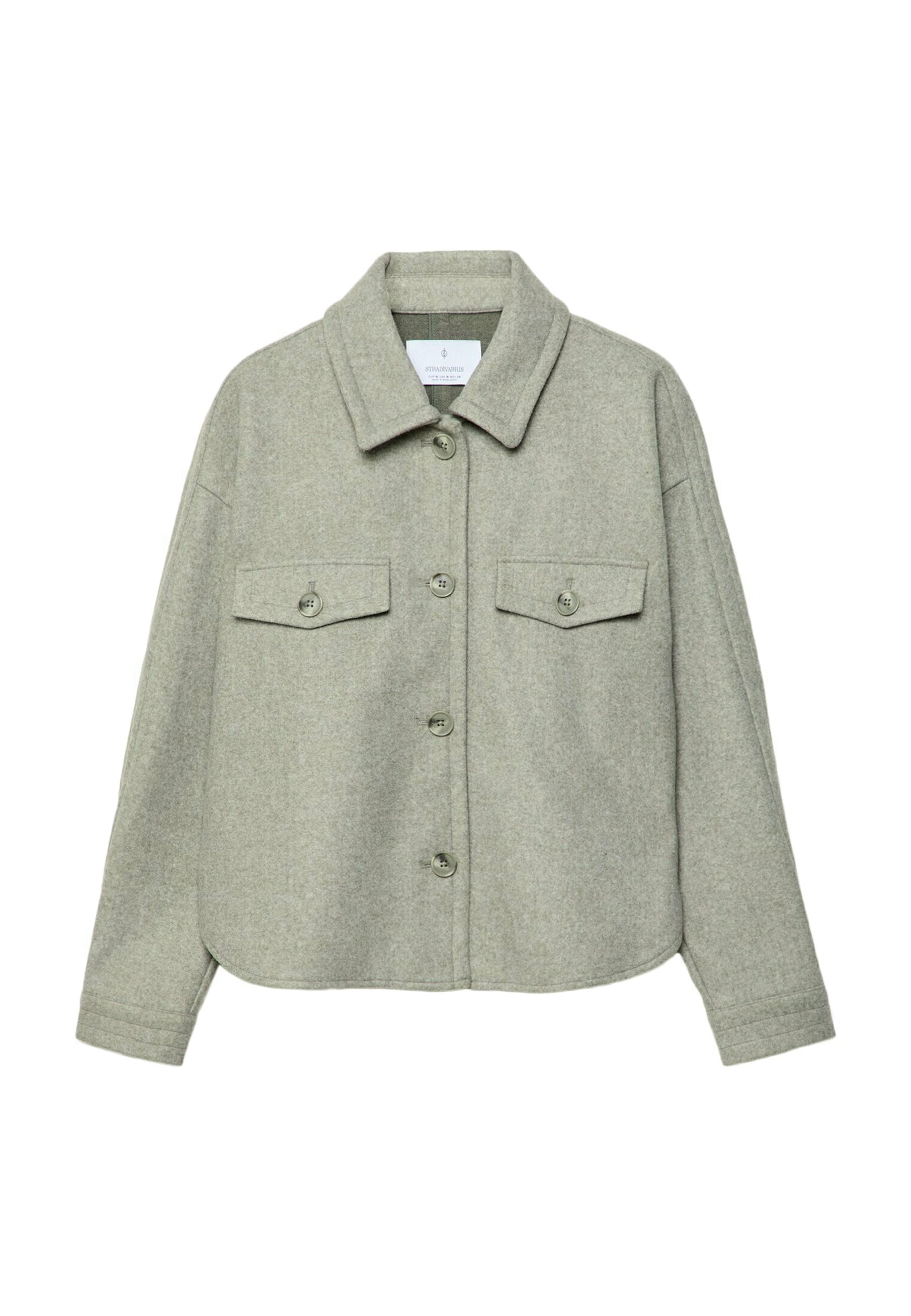 Grau gestaltete Wollmischungjacke mit Kragen, Vorderknöpfen und zwei Brusttaschen. Bietet eine lockere Passform und einen leicht gerundeten Saum.