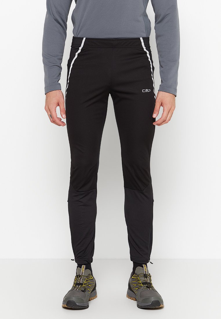 Schwarze Sporthose mit taillierter Passform, ausgestattet mit weißen Seitestreifen, aus dehnbarem Material, mit glattem Textur und schmal zulaufenden Beinen.