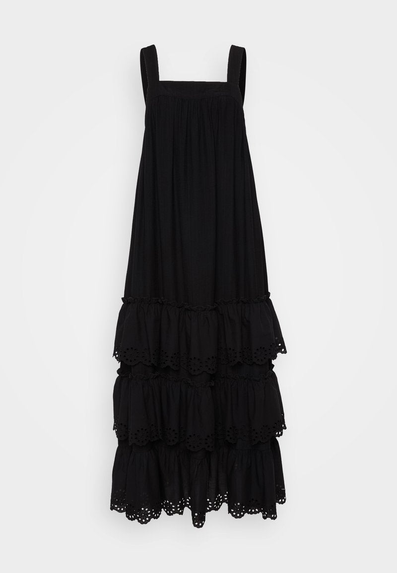 Schwarzes, ärmelloses Kleid mit rechteckigem Ausschnitt, gestuften Rüschen und Lochstickerei am Saum. Weicher Stoff.