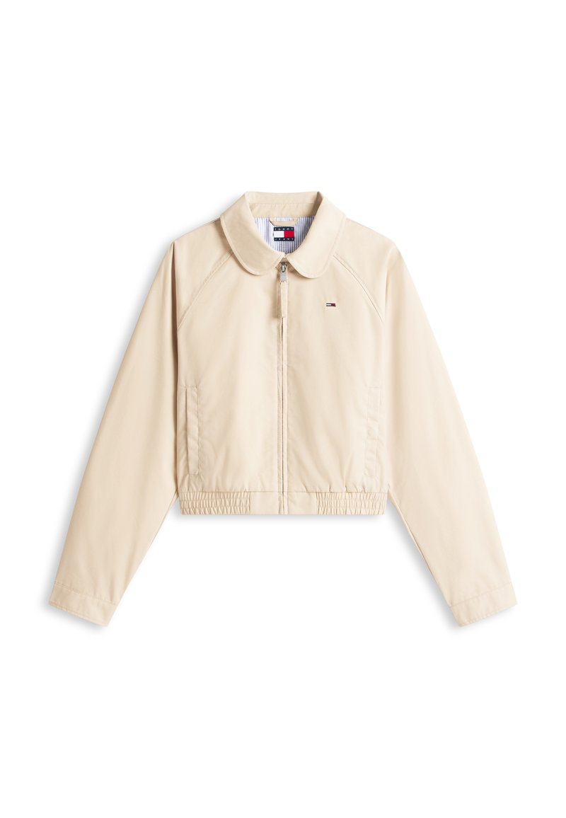 Hellbeige, langärmlige Jacke mit Reißverschluss, elastischem Taillenbund, spitzem Kragen, seitlichen Taschen und einem kleinen Tommy Hilfiger Logo auf der Brust.