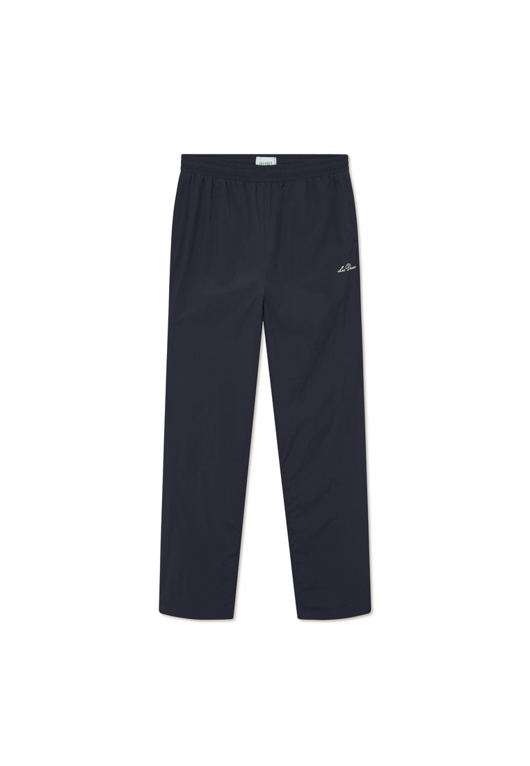 Marineblaue Trainingshose aus leichtem Material, mit elastischem Bund und kleinem gesticktem Logo auf der Vorderseite.