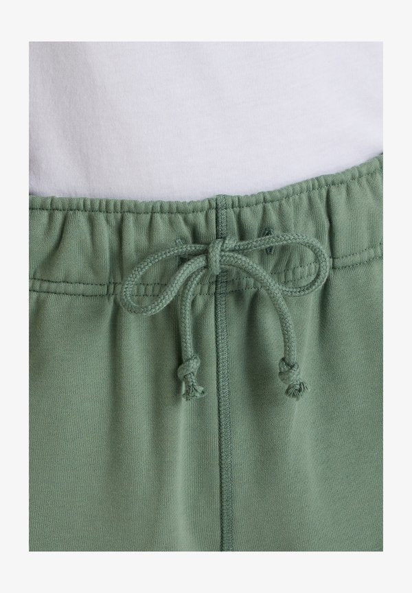 New Balance Tracksuit bottoms - green dkj