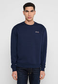 Marineblaue Sweatshirt aus Baumwolle, mit langen Ärmeln, einem Rundhalsausschnitt und einem kleinen gestickten Logo auf der Brust.