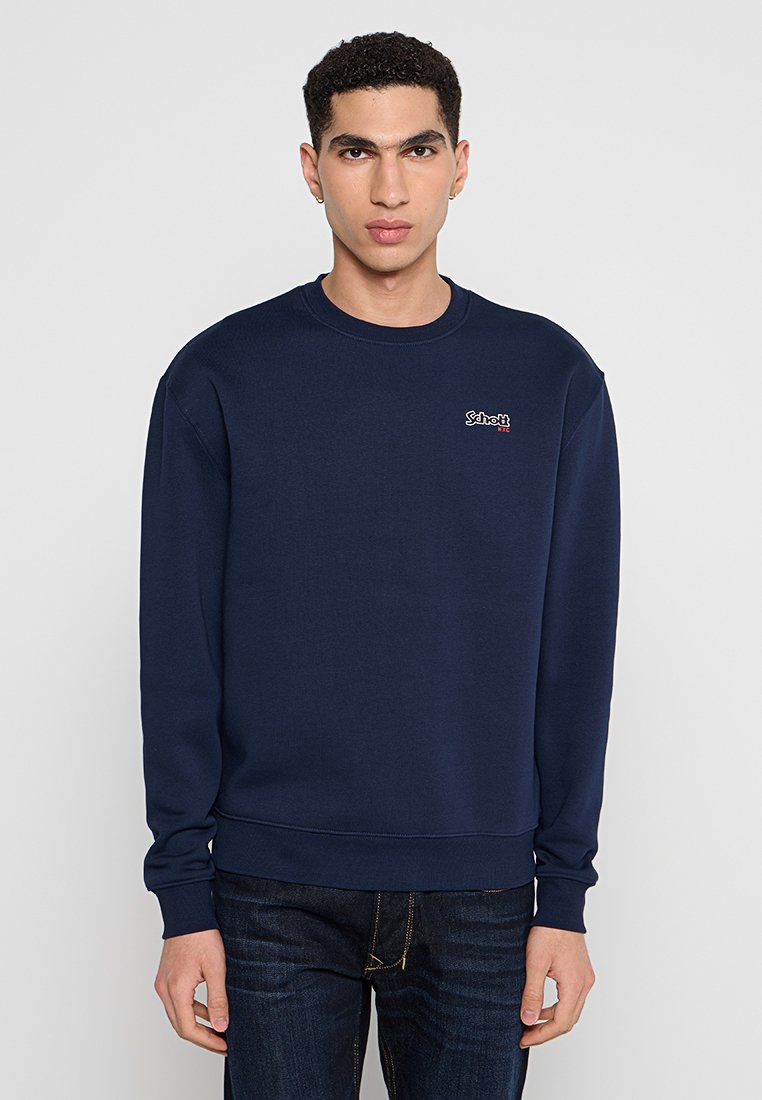 Marineblaue Sweatshirt aus Baumwolle, mit langen Ärmeln, einem Rundhalsausschnitt und einem kleinen gestickten Logo auf der Brust.