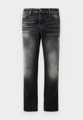Schwarze Jeans mit einem verblassten Finish und verwaschenen Akzenten, klassisches Fünf-Taschen-Design und Reißverschluss. Hergestellt aus Denim-Stoff.