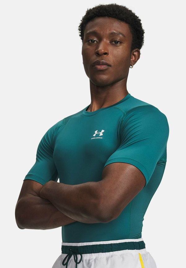 Under Armour HEATGEAR BASELAYER - Sports T-shirt - rack green