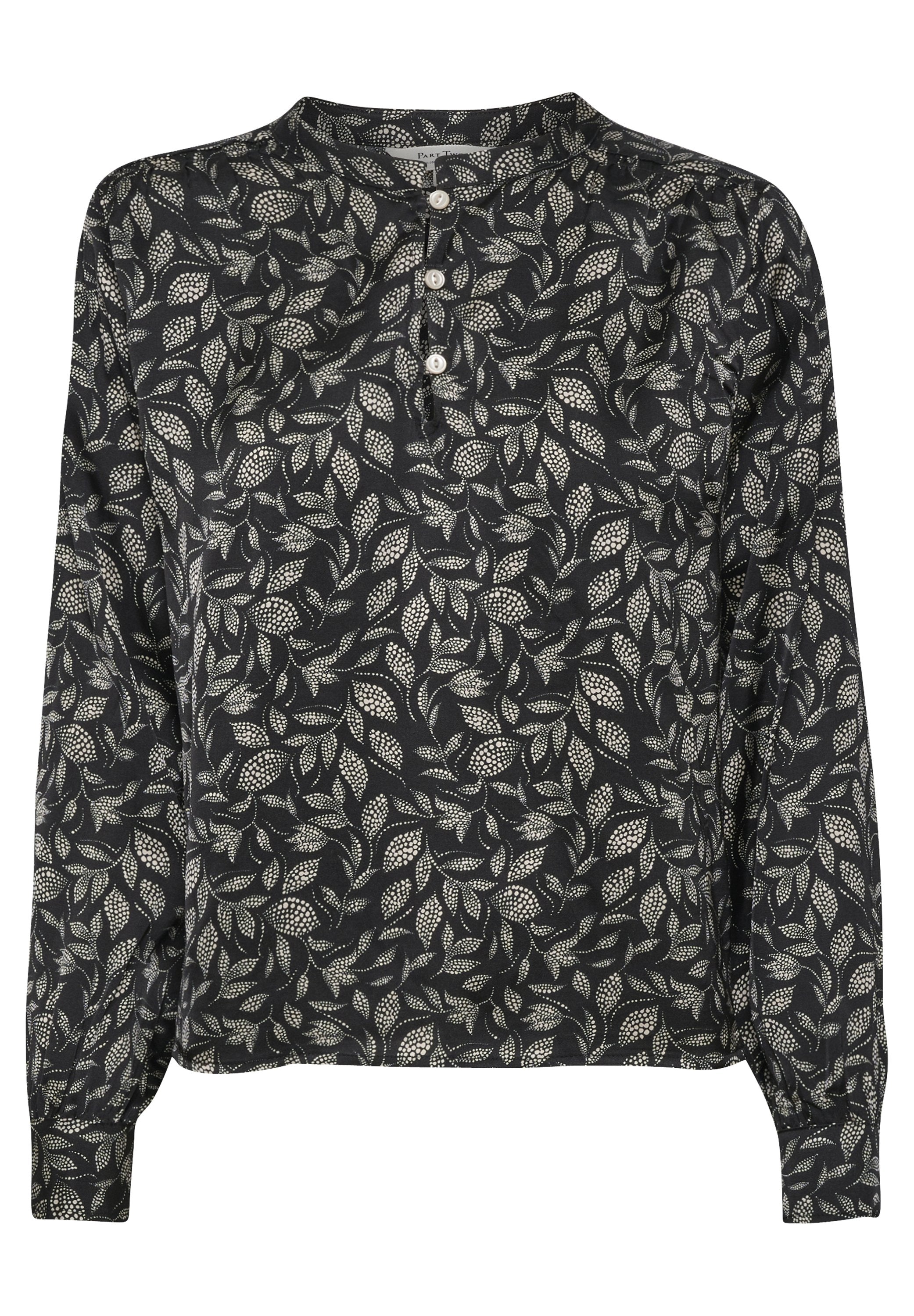 Schwarze Bluse mit langen Ärmeln und weißem Blattmuster, Knopfleiste und gerafften Manschetten. Hergestellt aus weichem Stoff mit glatter Textur.