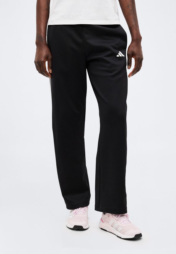 adidas Sportswear HOUSE OF TIRO - Tracksuit bottoms - black/white