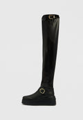 Schwarze Overknee-Stiefel mit glatter Oberfläche, ausgestattet mit einem goldenen Schnallendetail am Knöchel und einer dicken Plateau-Sohle.