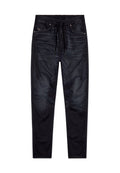 Schwarze Jogginghose aus Denim mit einem elastischen Bund, Kordelzug, Vordertaschen und dezenten Ausbleichungen an den Beinen.