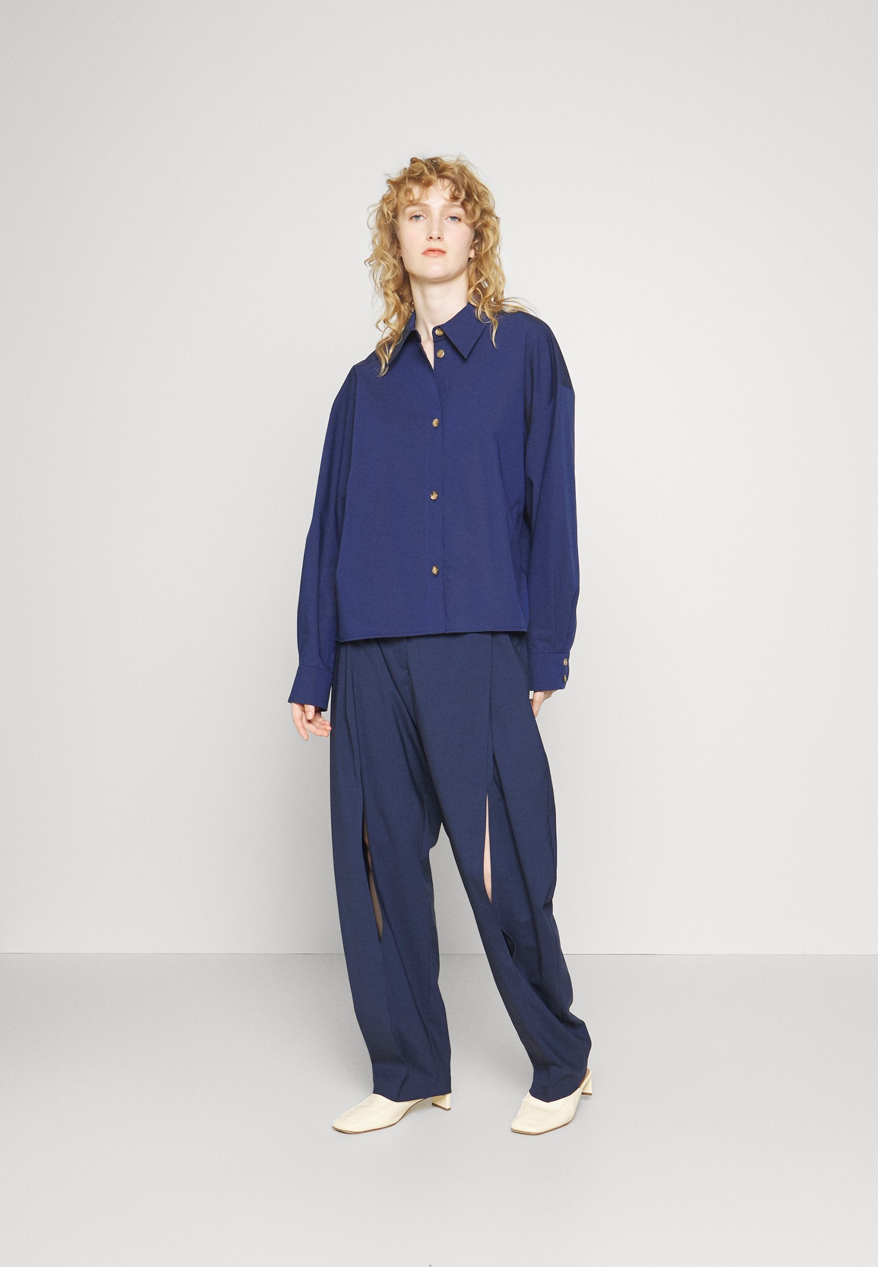 A.W.A.K.E. MODE TAPERED PANTS WITH VERTICAL SLIT KNEES