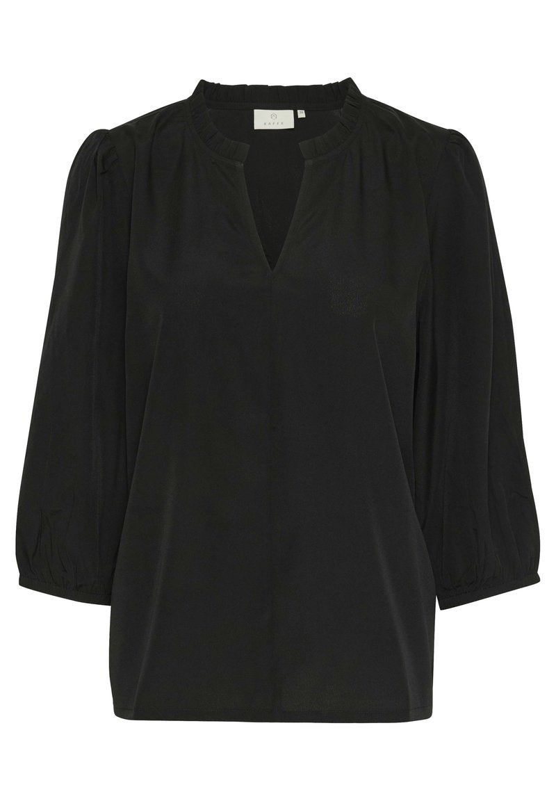 Schwarze Bluse mit V-Ausschnitt, gepufften Schulternähten und Dreiviertel-Puffärmeln. Glatter Stoff mit einem leichten Glanz.