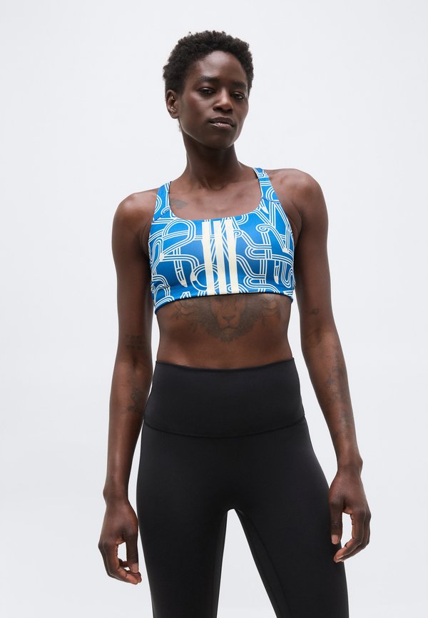 adidas Performance ADIDAS X FARM RIO OPTIME - Medium support sports bra - dark marine/talc/cream white