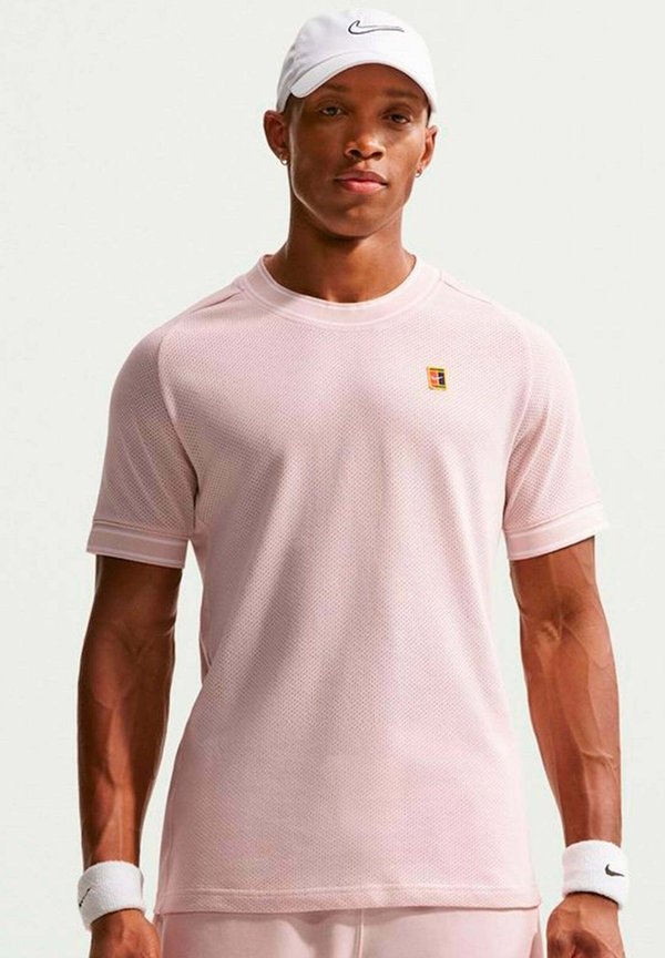 Nike Performance HERITAGE - Sports T-shirt - silt red