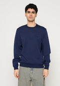 Marineblauer Pullover aus weichem Stoff, mit geripptem Rundhalsausschnitt und strukturierten Akzenten auf den Schultern. Lockere Passform und lange Ärmel.