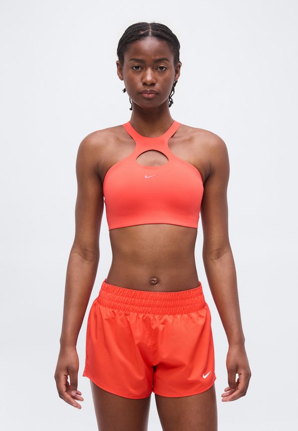 Nike Performance BRA - Medium support sports bra - light crimson/university red