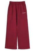 Burgunderfarbene Sweatpants mit weitem Bein, elastischem Bund, seitlichen Taschen und dem in Weiß gestickten "PEGADOR"-Logo nahe dem Bund.