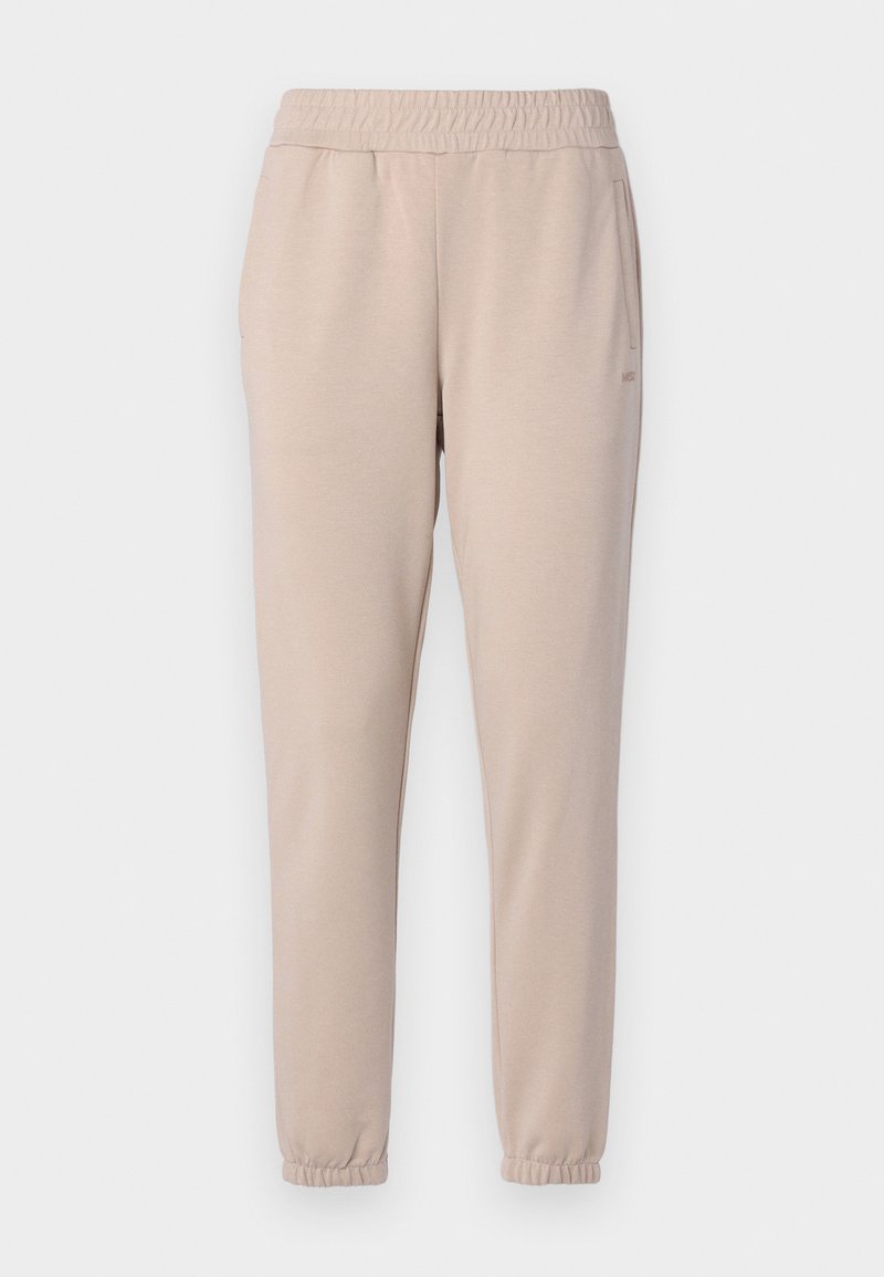 Beige Jogginghose mit einem elastischen Bund, zwei Seitentaschen und elastischen Bündchen am Knöchel. Hergestellt aus einem weichen, glatten Stoff.