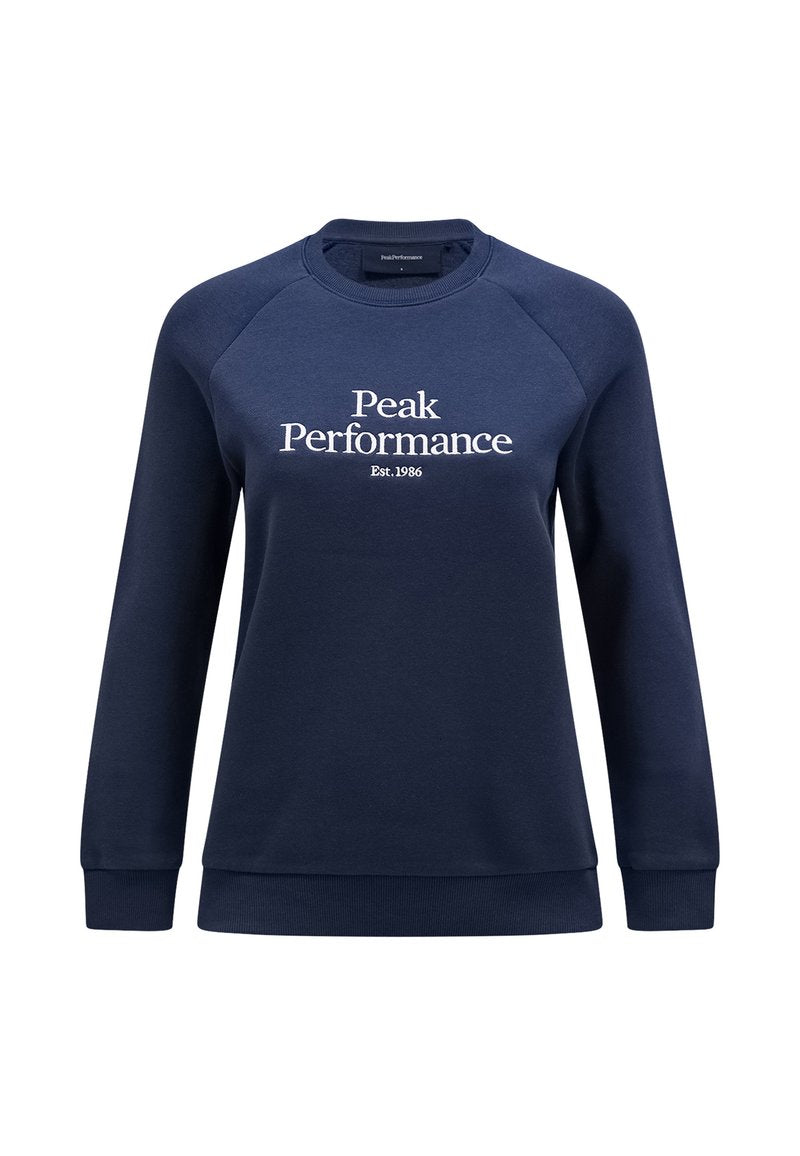 Navyblauer Pullover aus weichem Stoff, mit Rundhalsausschnitt, gerippten Bündchen und Saum, mit weißem Text, der "Peak Performance Est. 1986" lautet.