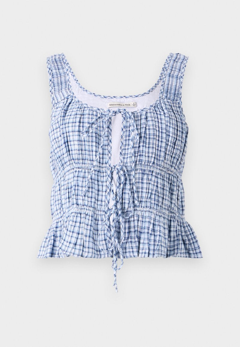 Blau-weißer kariertes Cropped-Top aus leichtem Stoff. Mit runder Ausschnitt, verstellbarem Bindeband und gerafften Texturen.
