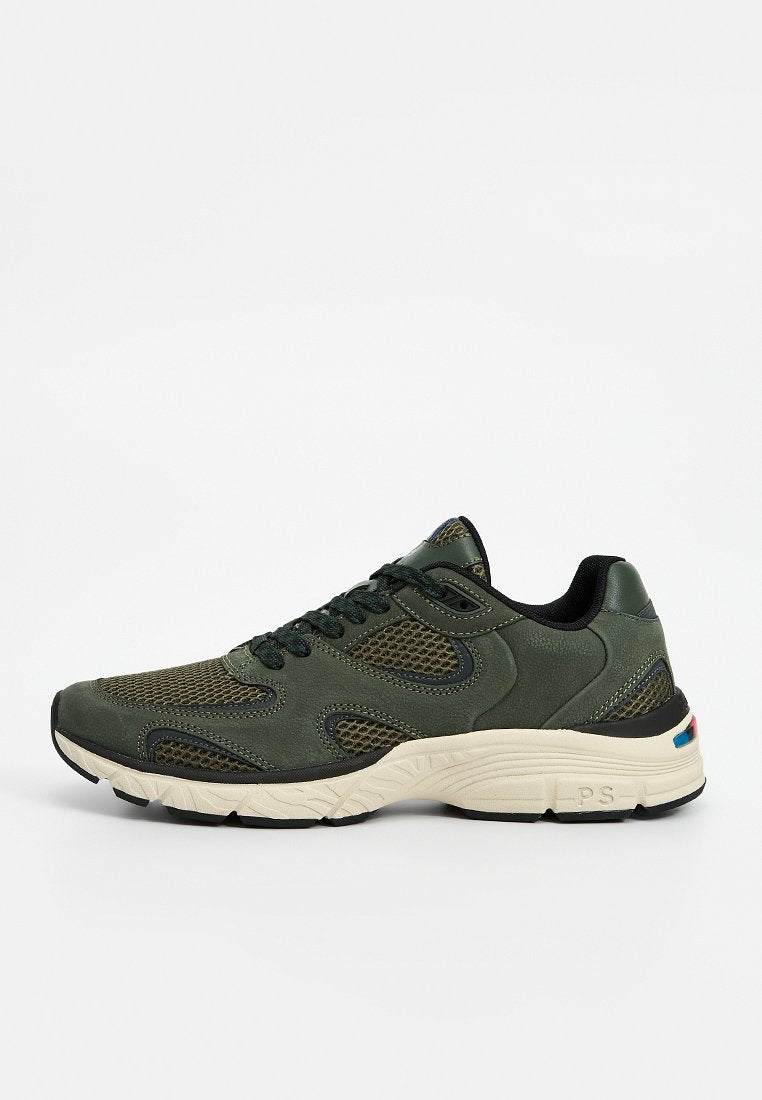 Grüne Sportschuhe mit Mesh-Einsätzen, Gummiaußensohle und gepolstertem Kragen. Verfügen über schwarze Akzente und einen bunten Streifen an der Ferse.